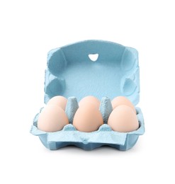 Photo of Raw chicken eggs in egg carton isolated on white