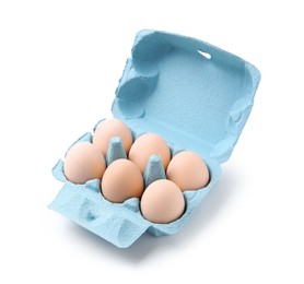 Photo of Raw chicken eggs in egg carton isolated on white