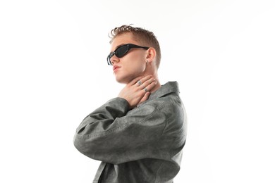 Photo of Handsome young man wearing stylish jacket and sunglasses on white background