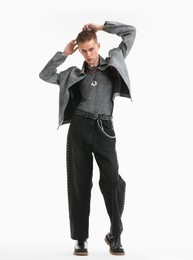 Photo of Handsome young man wearing stylish jacket on white background