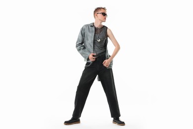 Photo of Handsome young man wearing stylish jacket and sunglasses on white background