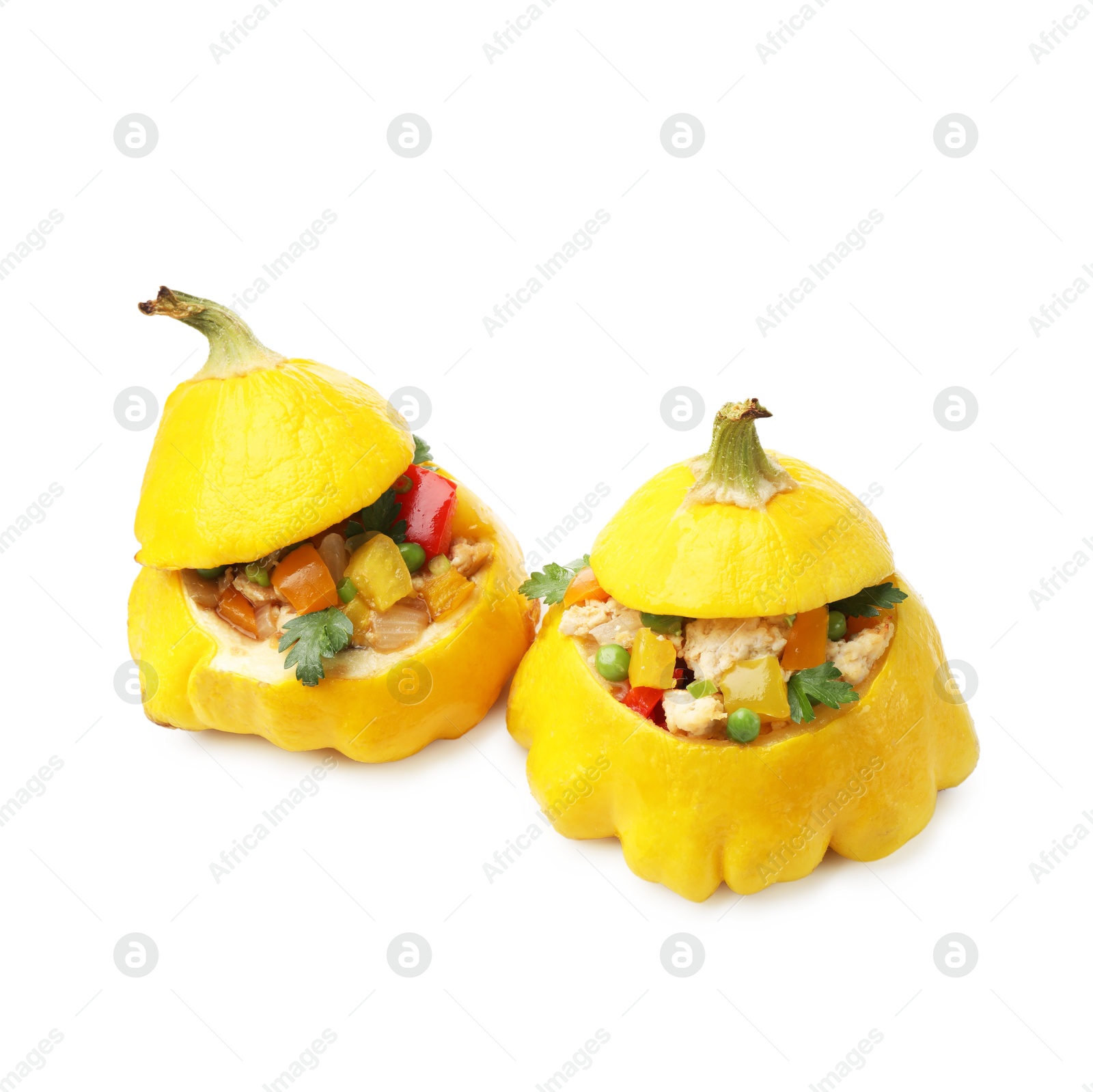 Tasty stuffed pattypan squashes isolated on white Photo of Tasty stuffed pattypan squashes isolated on white