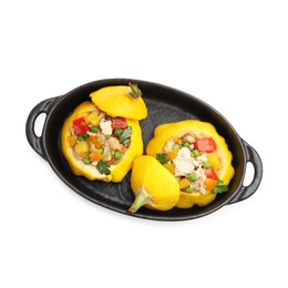Photo of Tasty stuffed pattypan squashes in baking dish isolated on white, top view