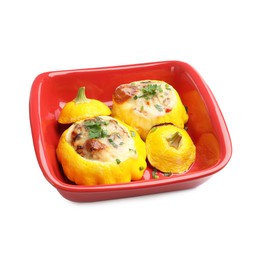 Photo of Tasty stuffed pattypan squashes in baking dish isolated on white