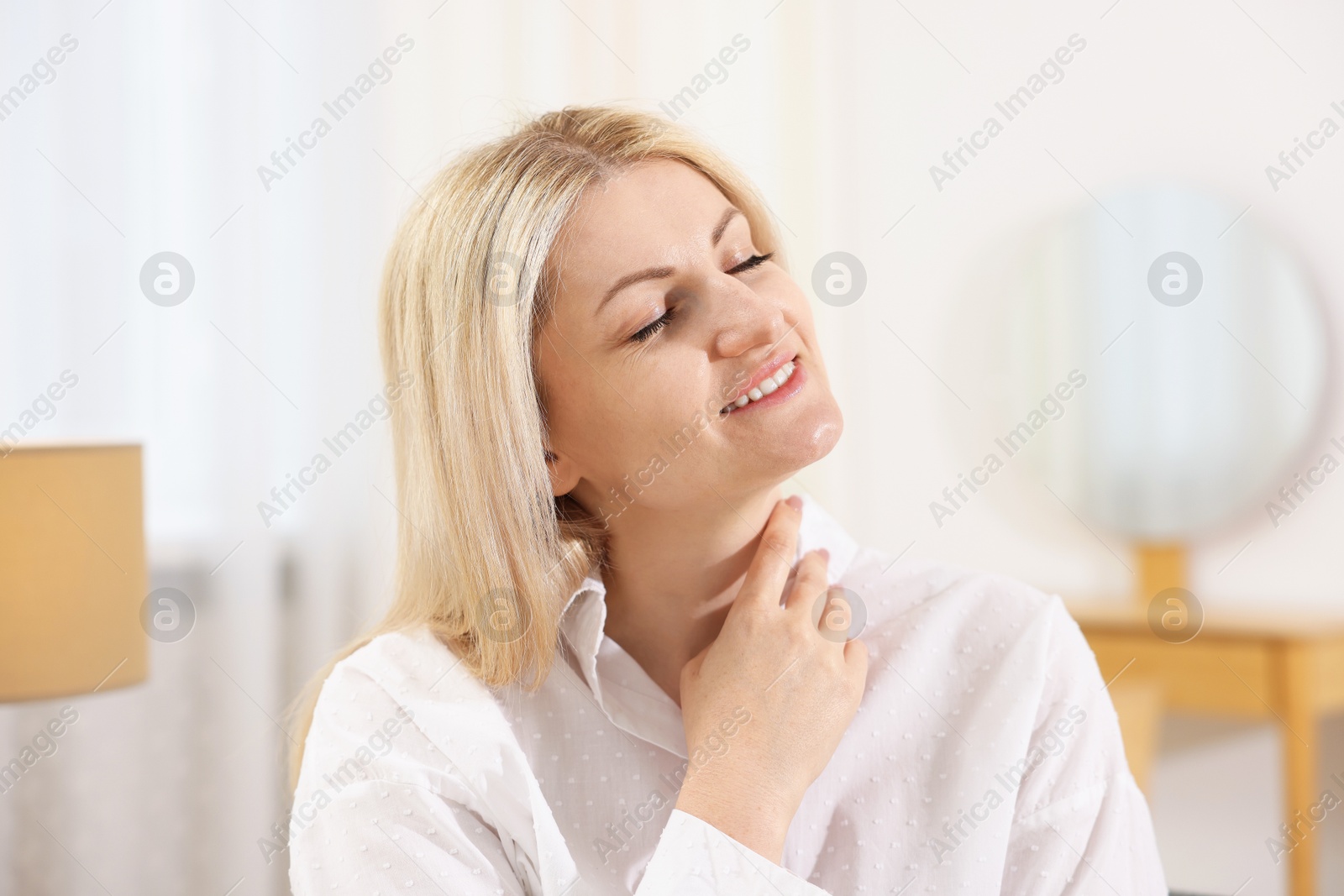 Dreams come true. Woman thinking about something at home Photo of Dreams come true. Woman thinking about something at home