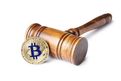 Photo of Cryptocurrency. Bitcoin and judge's gavel isolated on white