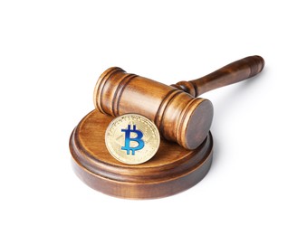 Photo of Cryptocurrency. Bitcoin and judge's gavel isolated on white