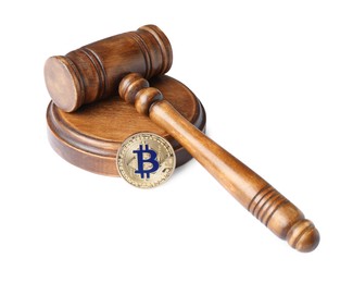 Photo of Cryptocurrency. Bitcoin and judge's gavel isolated on white
