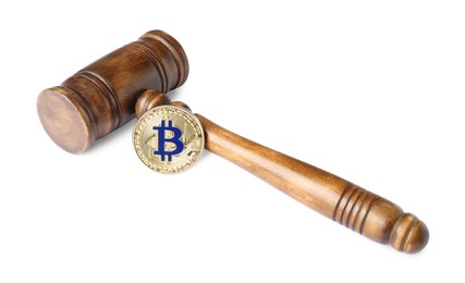 Photo of Cryptocurrency. Bitcoin and judge's gavel isolated on white