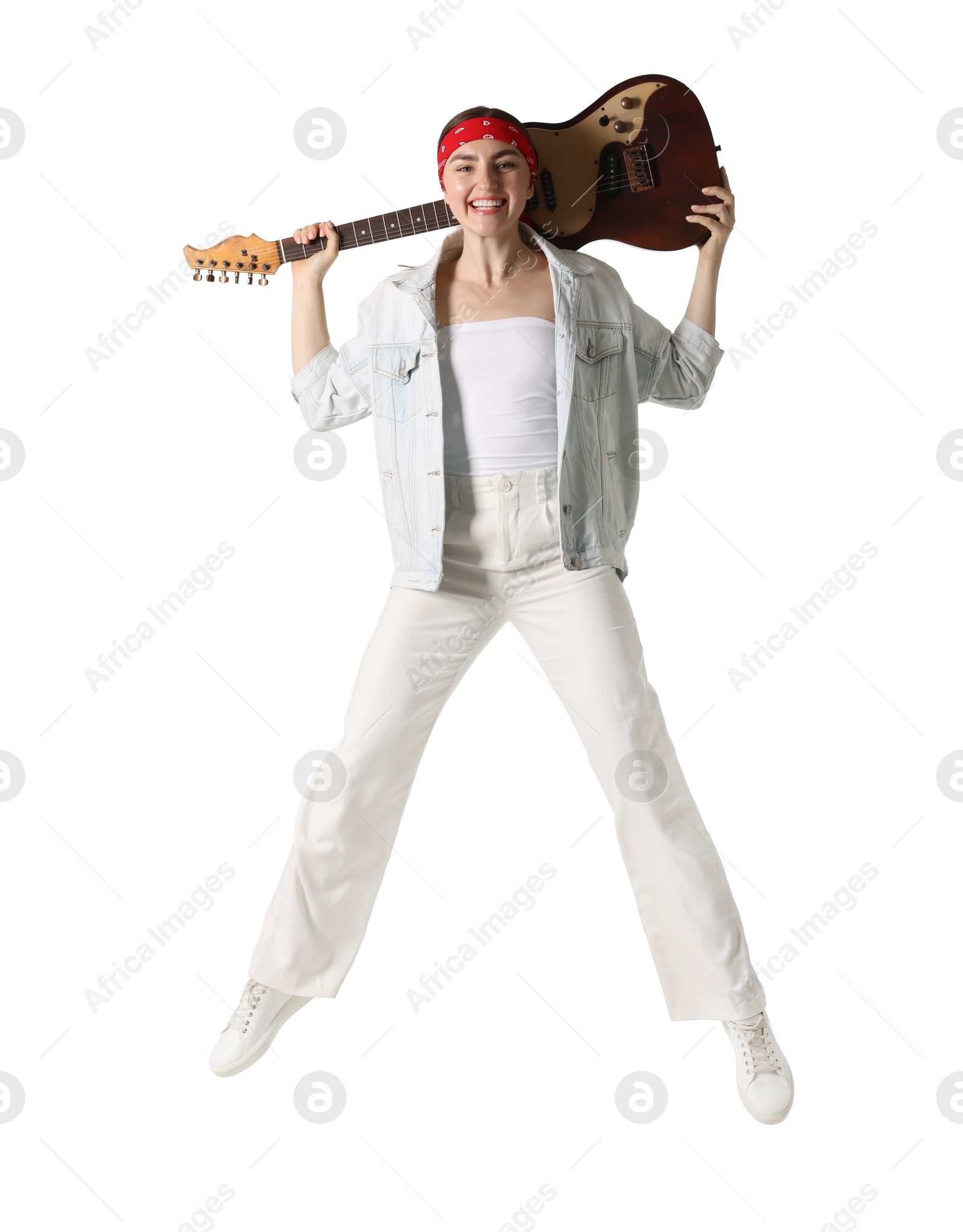 Woman with guitar jumping on white background Photo of Woman with guitar jumping on white background