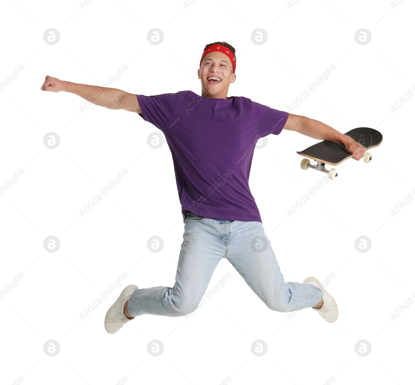 Man with skateboard jumping on white background Photo of Man with skateboard jumping on white background