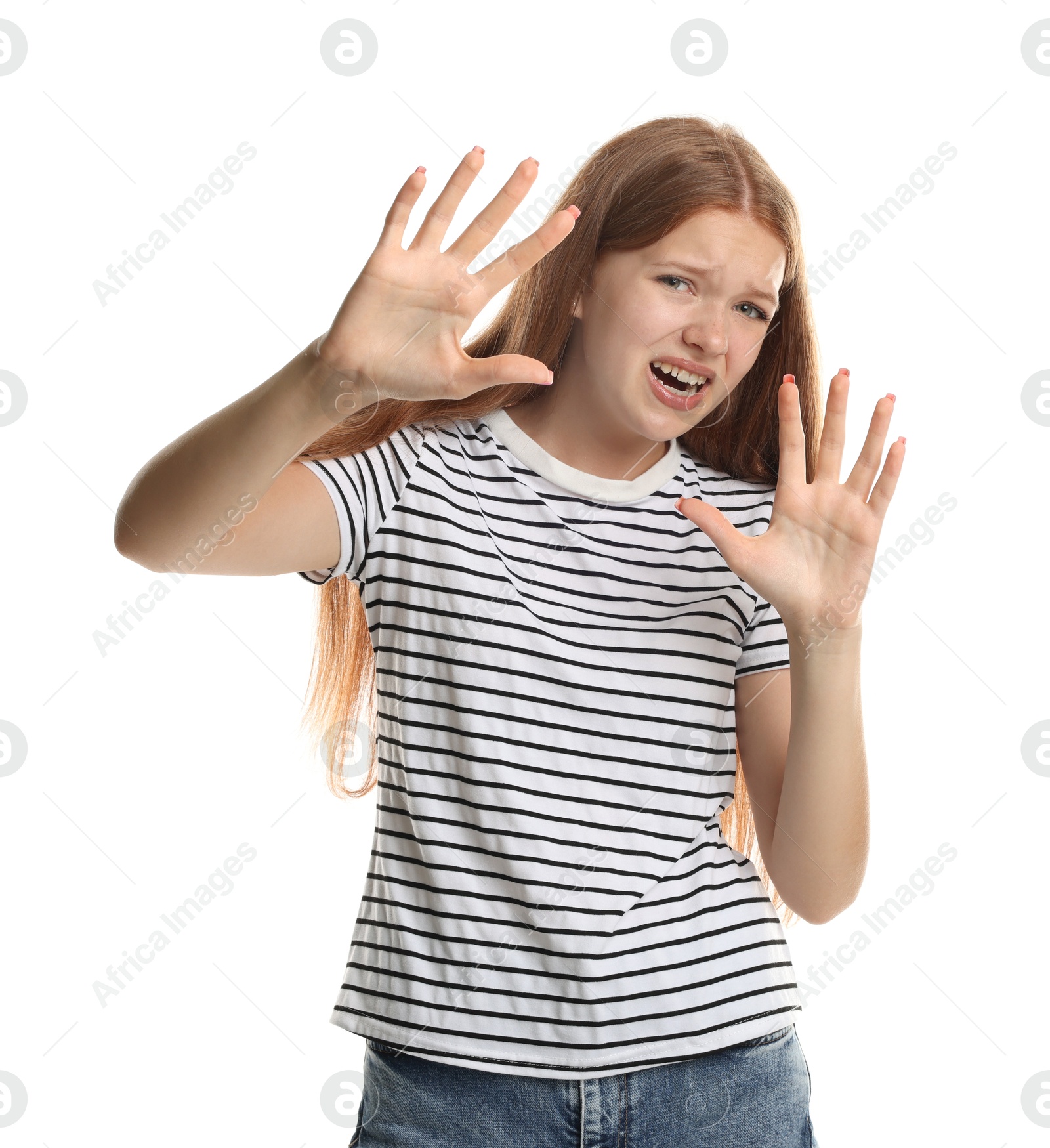 Photo of Teenage girl suffering from panic attack on white background