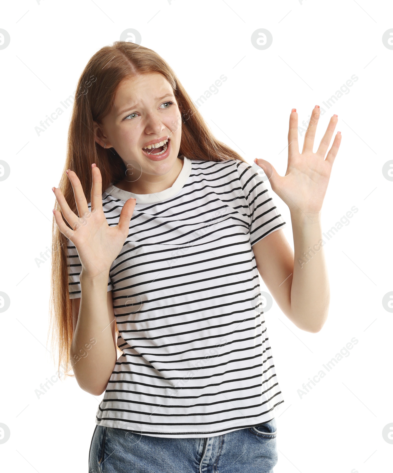 Photo of Teenage girl suffering from panic attack on white background