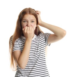 Photo of Teenage girl suffering from panic attack on white background