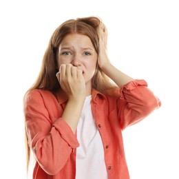 Photo of Teenage girl suffering from panic attack on white background