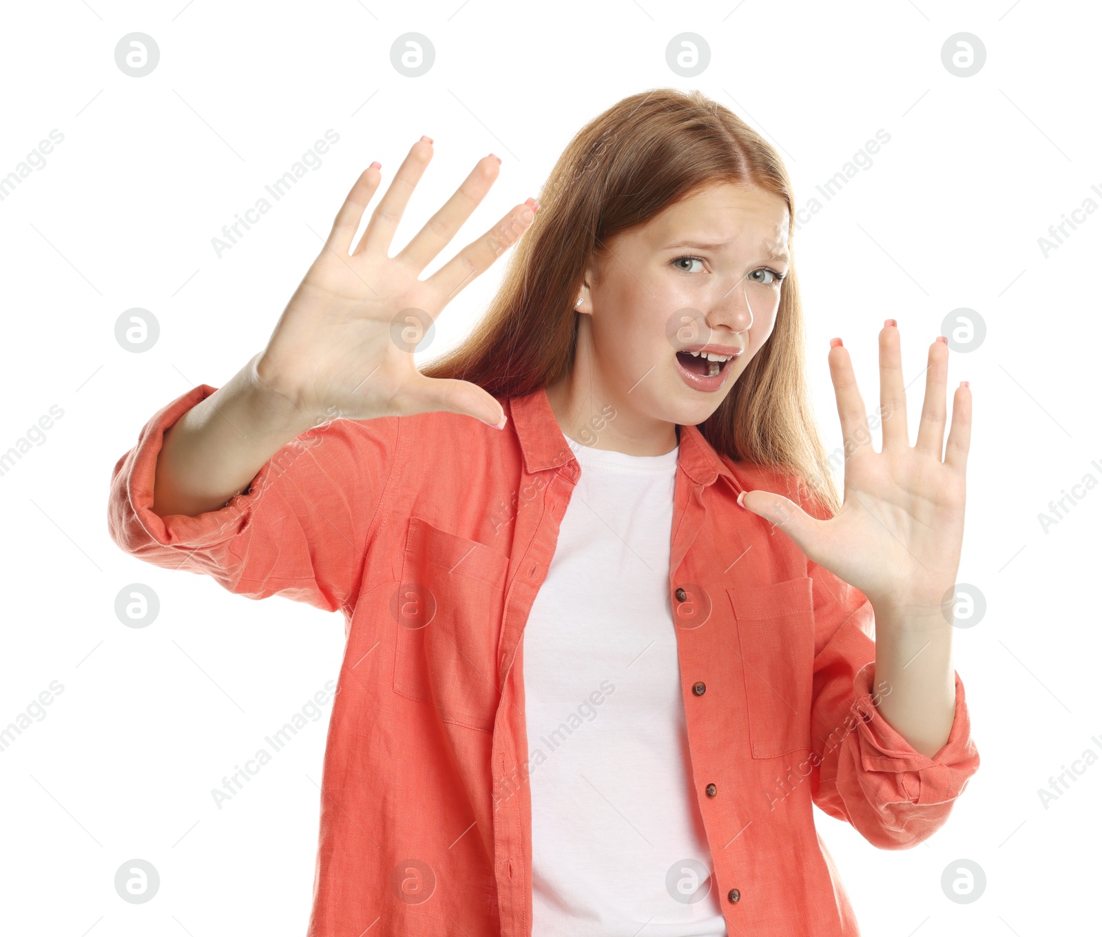 Teenage girl suffering from panic attack on white background Photo of Teenage girl suffering from panic attack on white background