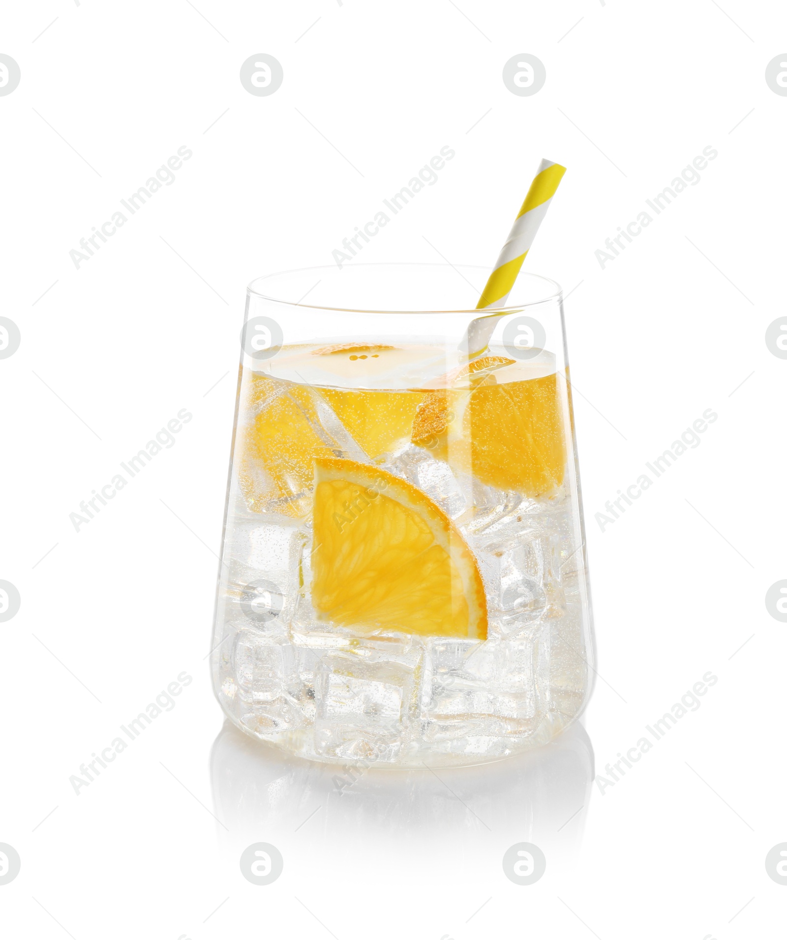 Photo of Sparkling water with orange slices in glass isolated on white