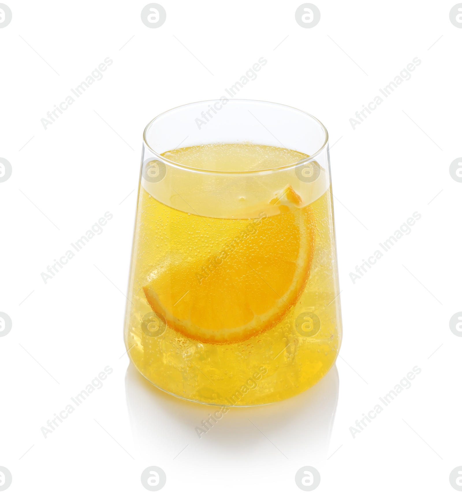 Photo of Refreshing soda water with orange slice in glass isolated on white