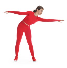 Photo of Teenage girl in sportswear stretching on white background