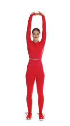 Photo of Teenage girl in sportswear stretching on white background