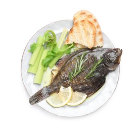 Photo of Tasty roasted flounder fish with rosemary, celery, lemon slices and toasted bread isolated on white, top view. Homemade seafood dish