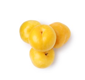 Photo of Whole ripe yellow cherry plums isolated on white, top view