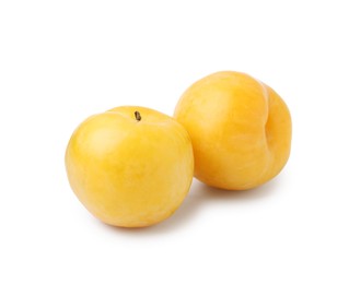 Photo of Whole ripe yellow cherry plums isolated on white