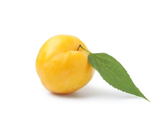 Photo of One yellow cherry plum with leaf isolated on white