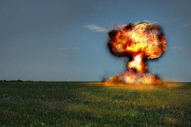 Image of Explosion with fire and smoke outdoors. Radioactive hazard