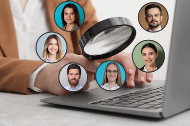 Image of Recruiter with magnifying glass and candidates' photos at table, closeup. Human resources management