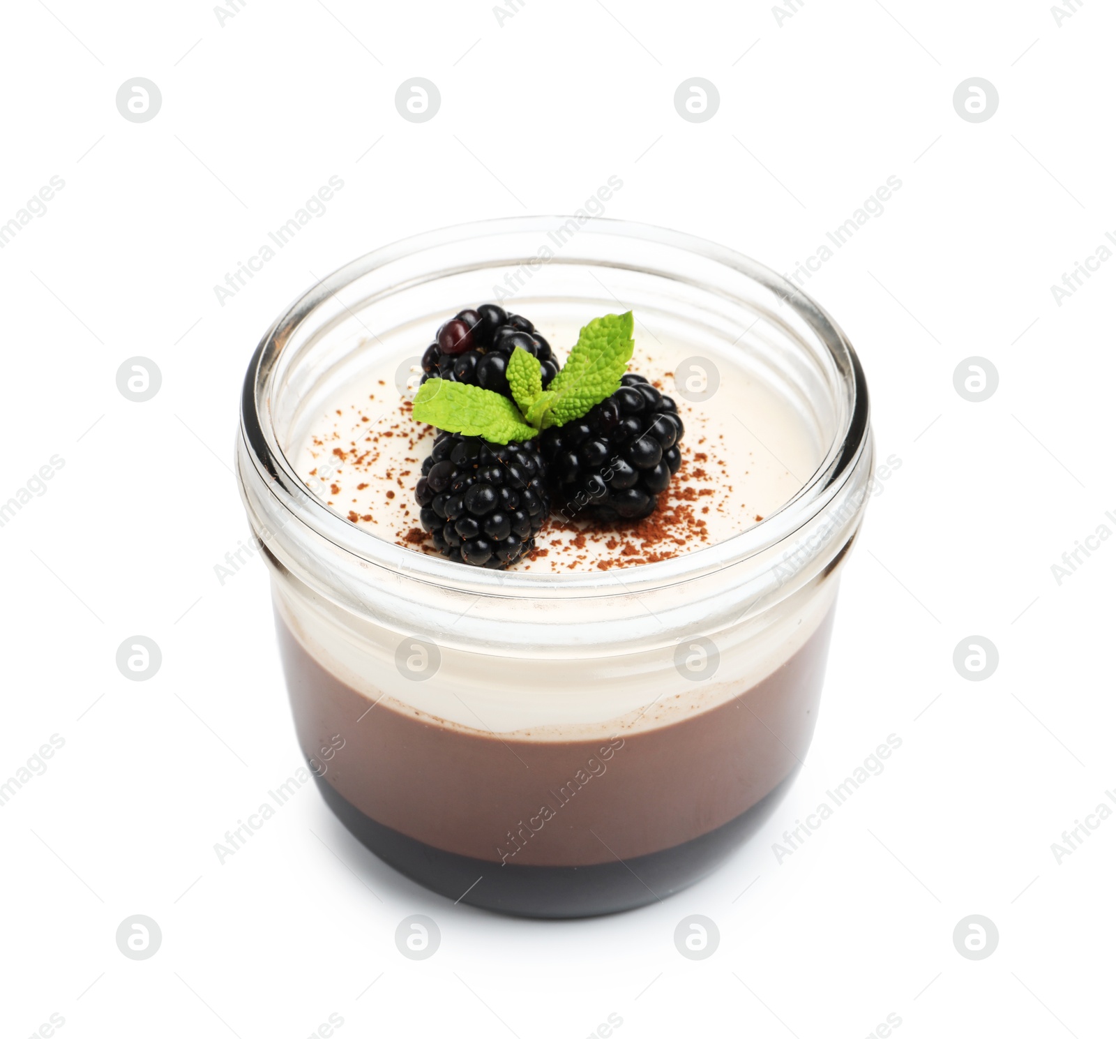 Photo of Tasty panna cotta with blackberries, mint and cocoa powder in jar isolated on white