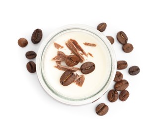 Photo of Delicious panna cotta with chocolate chunks and coffee beans isolated on white, top view