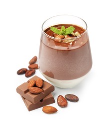 Photo of Delicious panna cotta with almonds, cocoa beans and chocolate pieces isolated on white