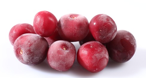Photo of Pile of ripe frozen cherries on white background, closeup