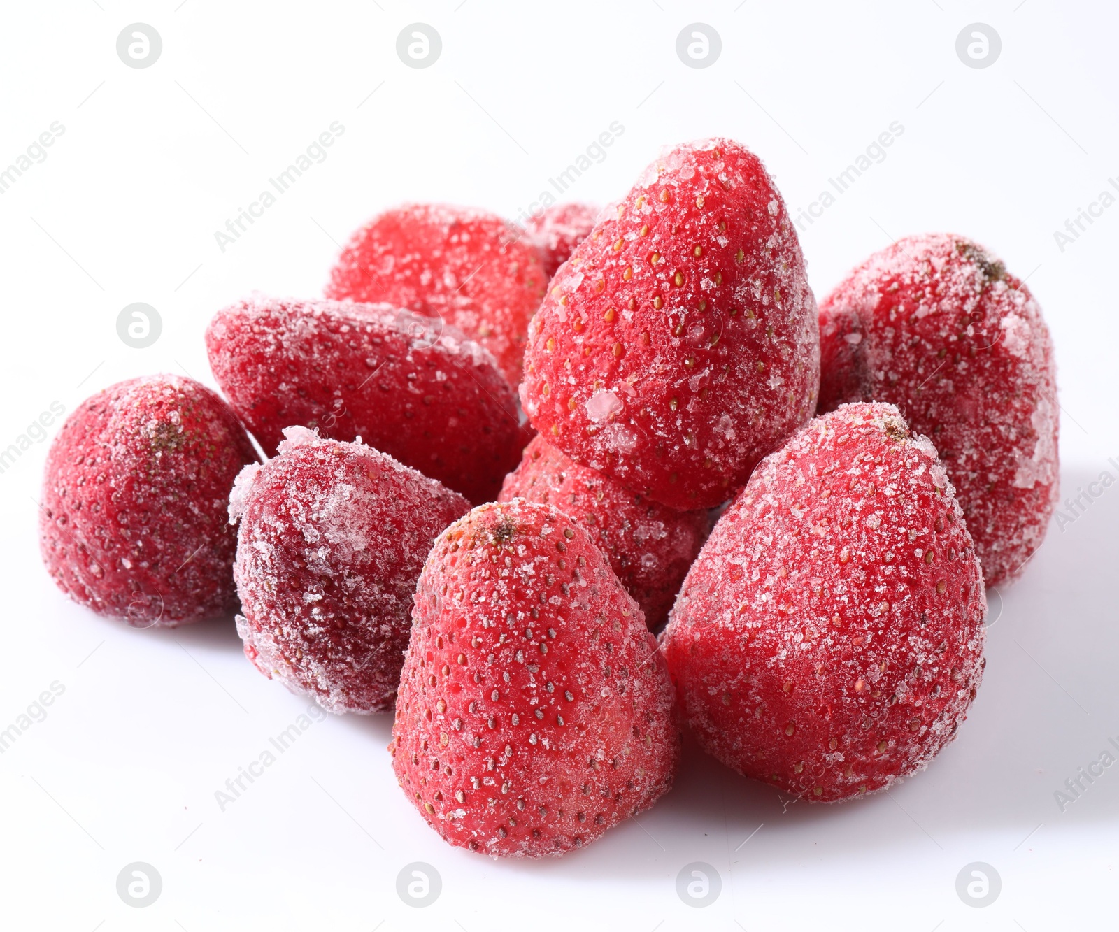 Photo of Pile of ripe frozen strawberries on white background, closeup
