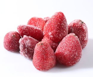Photo of Pile of ripe frozen strawberries on white background, closeup