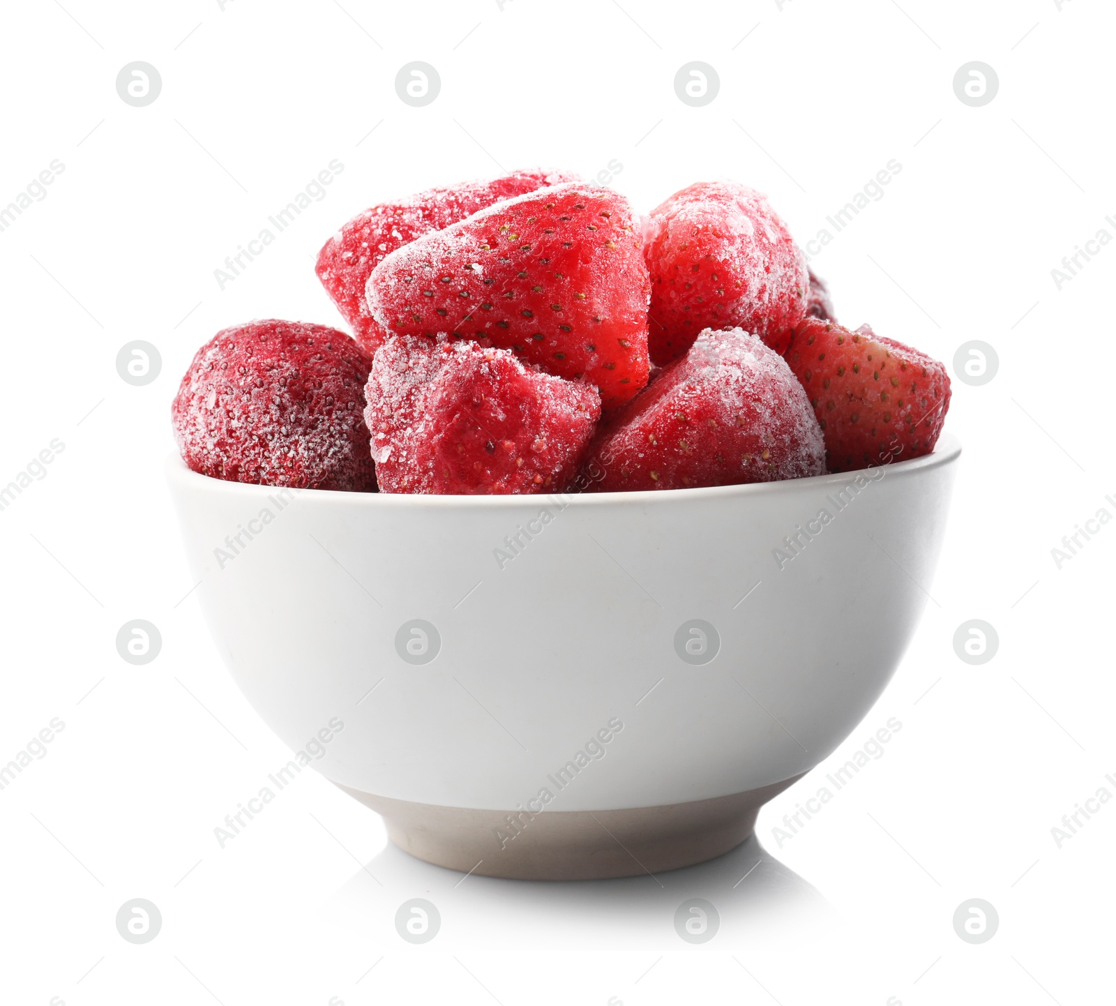 Photo of Ripe frozen strawberries in bowl isolated on white