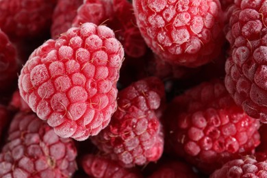 Photo of Ripe frozen raspberries as background, above view