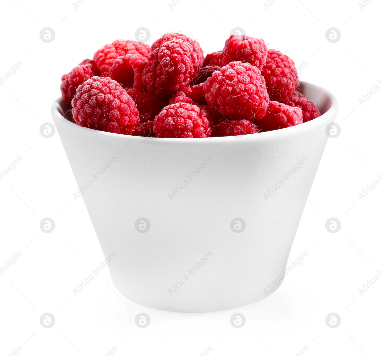 Photo of Ripe frozen raspberries in bowl isolated on white