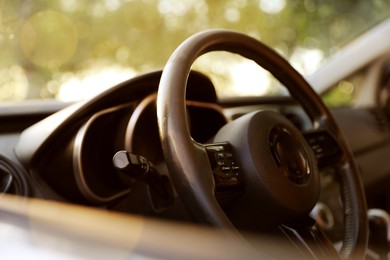 Photo of Steering wheel in modern car, view from outside