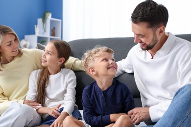 Photo of Happy family spending time together at home