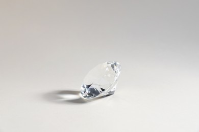 Photo of Aura. One beautiful diamond on light background