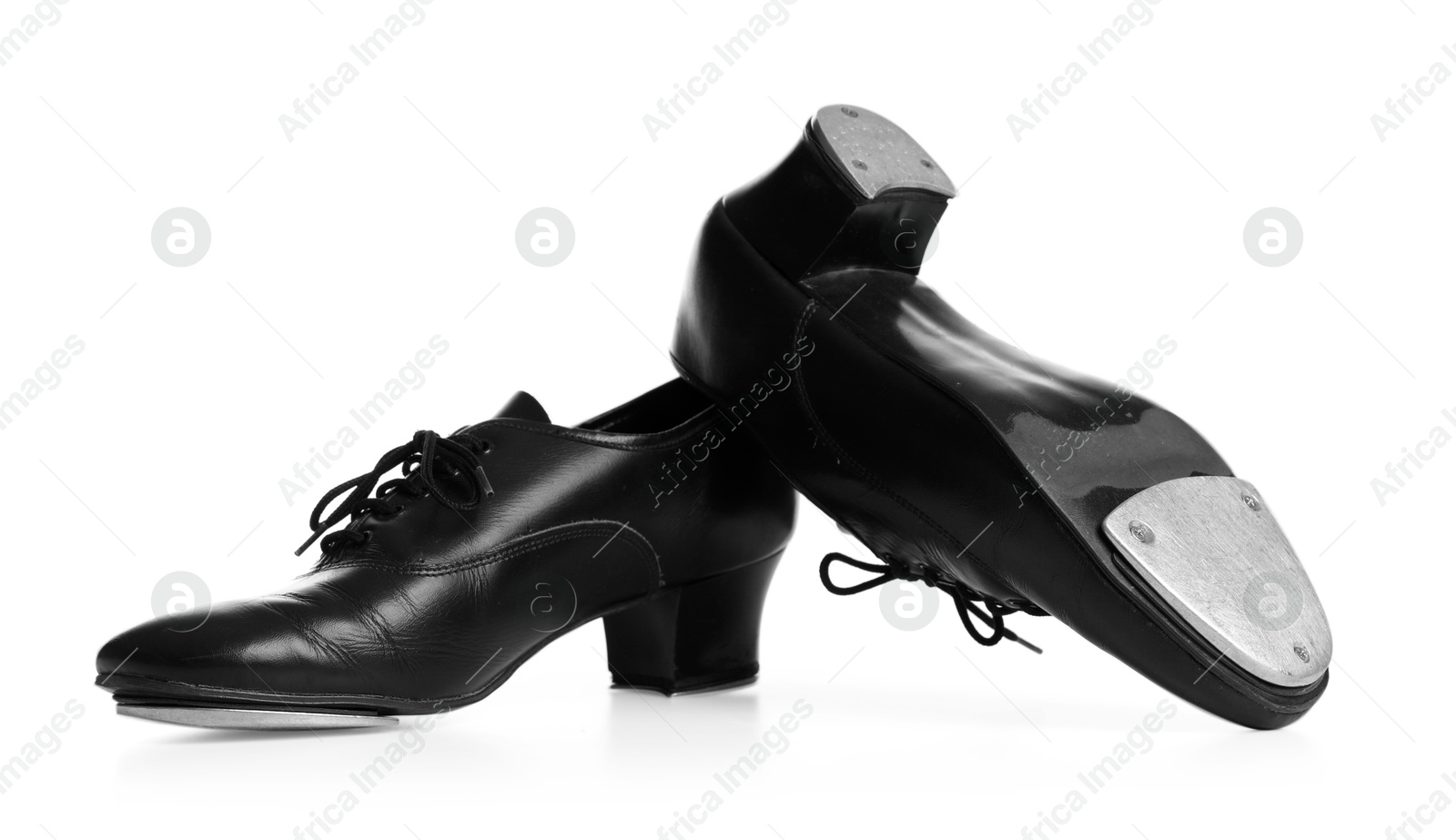 Pair of tap shoes isolated on white. Tap dance Photo of Pair of tap shoes isolated on white. Tap dance