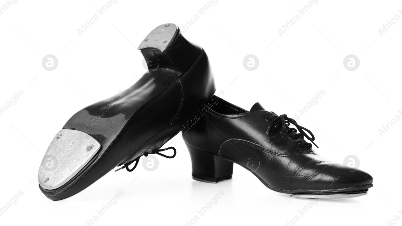 Pair of tap shoes isolated on white. Tap dance Photo of Pair of tap shoes isolated on white. Tap dance