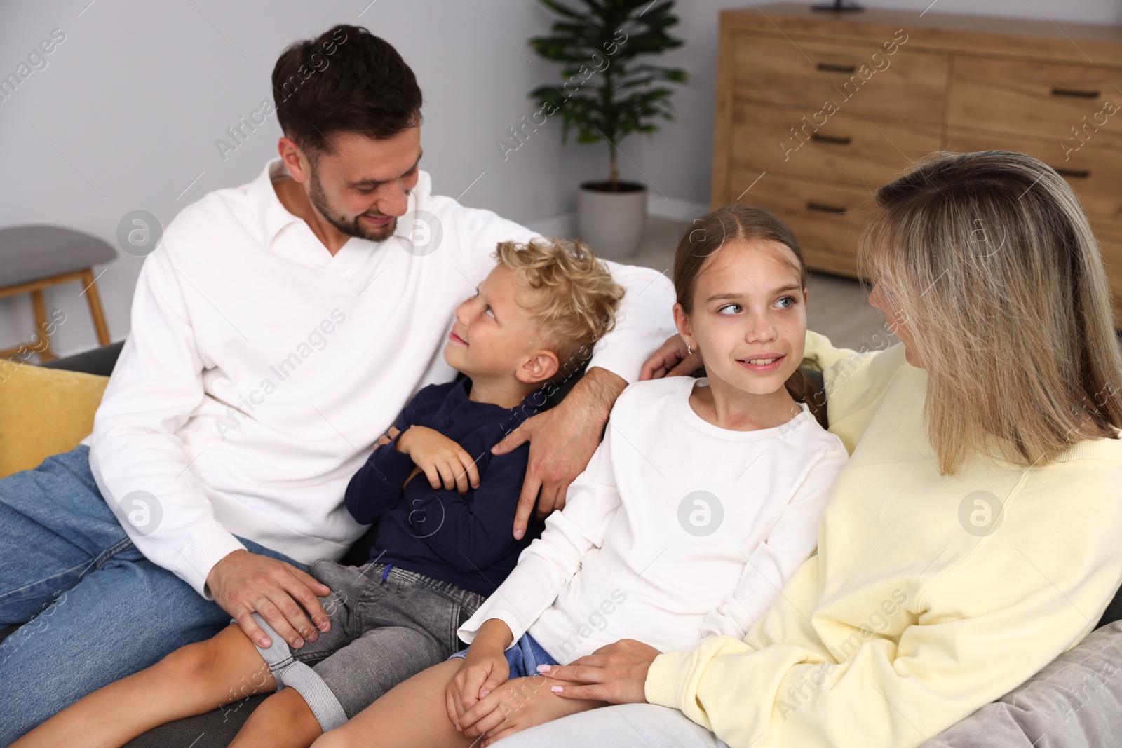 Photo of Happy family spending time together at home