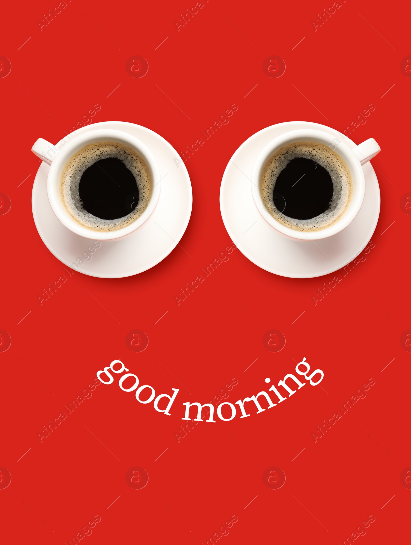 Image of Good morning card. Coffee in cups as eyes and phrase as smile on red background, top view