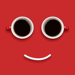 Image of Coffee in cups and line making smiling face on red background, top view