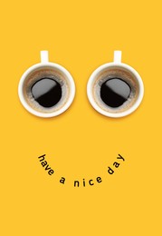 Image of Coffee in cups as eyes and phrase Have A Nice Day as smile. Cute card or poster design on orange background, top view