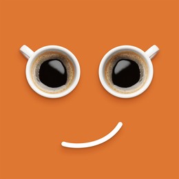 Image of Coffee in cups and line making smiling face on pale brown background, top view