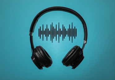 Image of Headphones and sound waves against light blue background